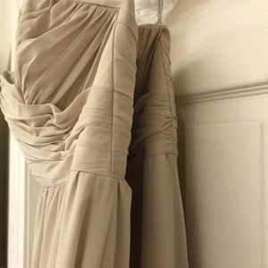 Two Alfred Angelo bridesmaids dresses.